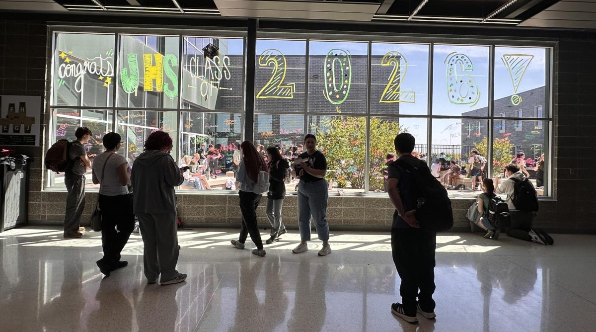 After enjoying their meal together, seniors were invited to leave their mark on the front windows at JHS. 